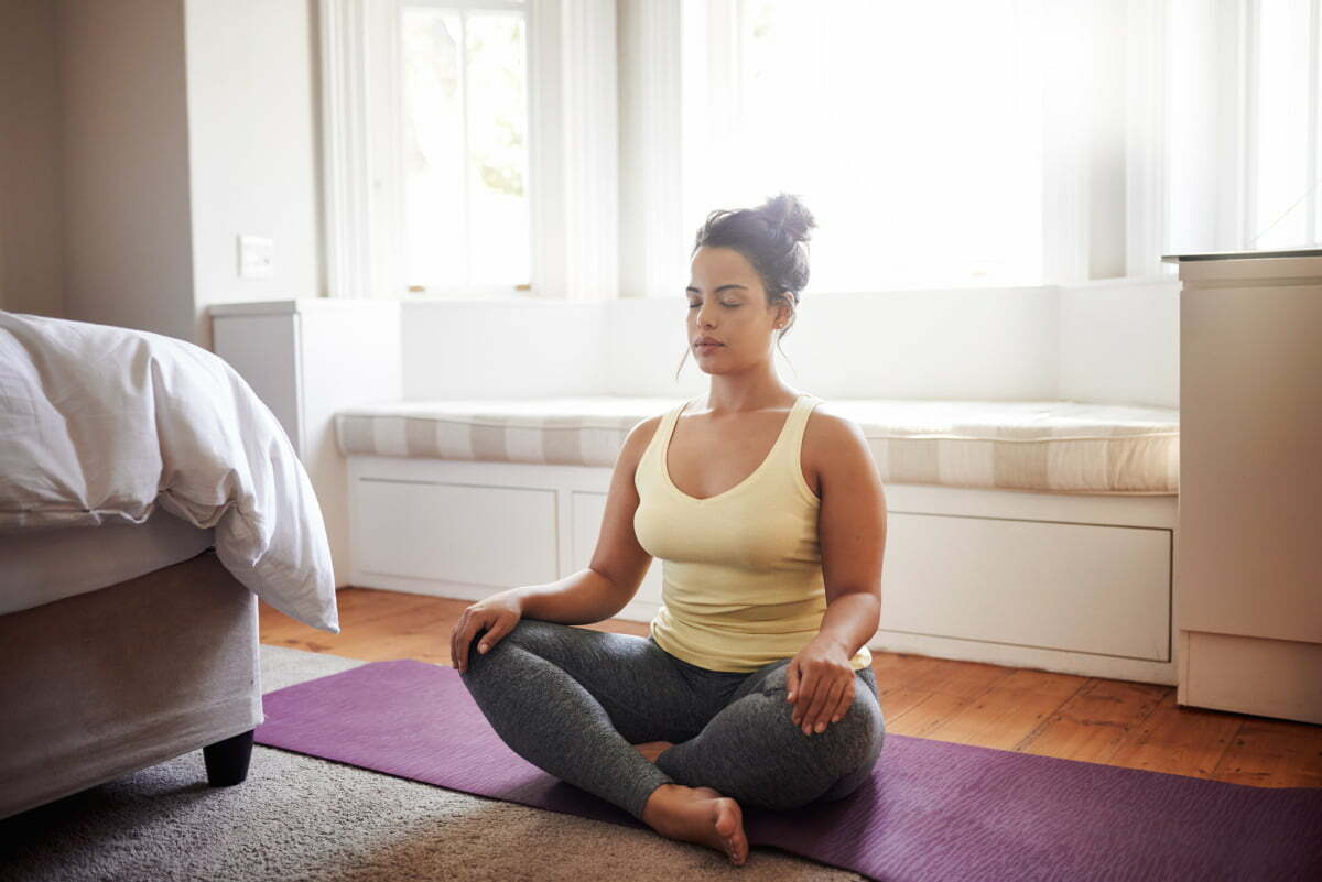Young Woman Practicing Meditation