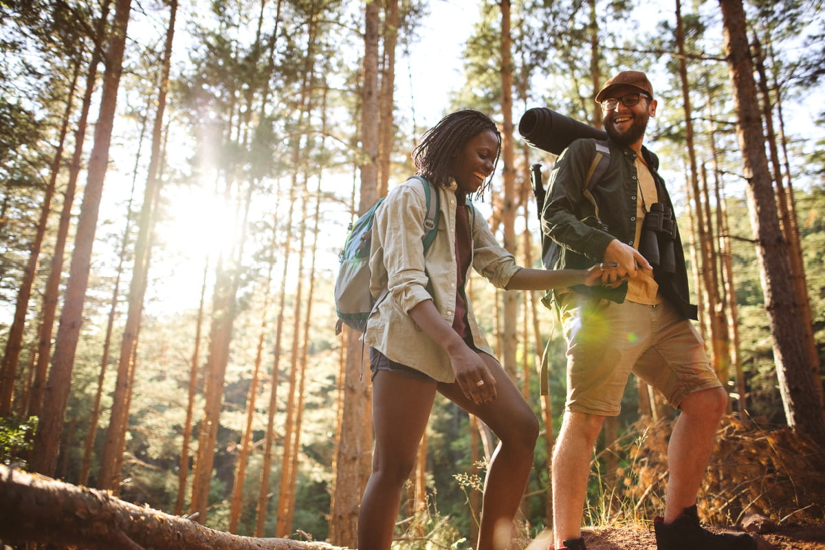 Man and Woman Hiking Together in Forest Near Fairfax County, VA in the Spring and Summer